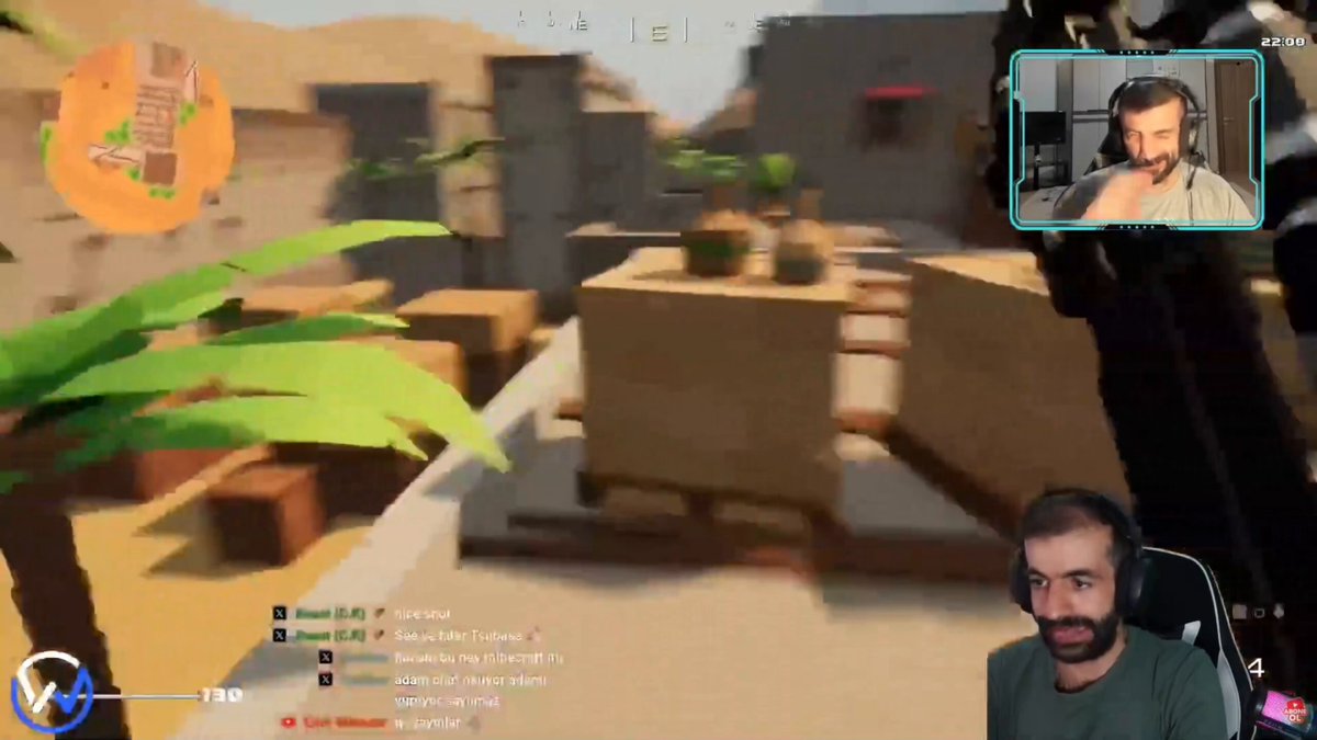 The image shows a man wearing headphones, playing a video game with his computer screen displaying a game scene. The game appears to be set in a desert environment, featuring a palm tree and other elements typical of such a setting. The caption on the image reads "This is not gaming SUPERCYCLE! @Tech3Play @PolyGunnerz's copy is now in Solana". This suggests that the man might have been playing a game from another source or platform rather than using a gaming console specifically designed for the game.