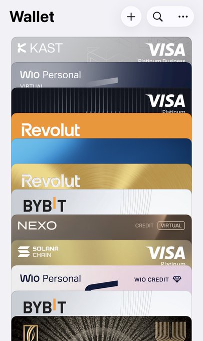 A digital wallet interface displays a stack of cards from providers including KAST, Wio Personal, Revolut, BYBIT, NEXO, and Solana Chain Visa Platinum.