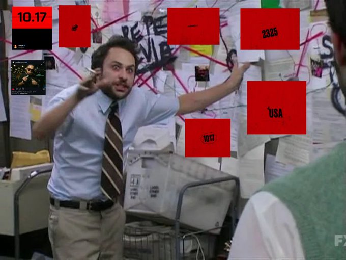 A scene showing a man in a blue shirt and tie pointing emphatically in a chaotic office with graffiti on the walls. Several red boxes with censored text, including '10.17', '2325', 'USA', and '1017', are overlaid on the image.
