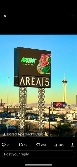 A Twitter/X post from Bored Ape Yacht Club showing a billboard in Las Vegas with the text 'AREA15' and a colorful ape skull logo, with the Stratosphere tower visible in the background.