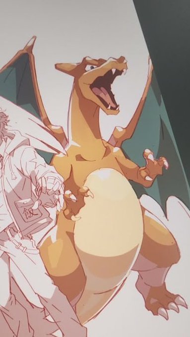 An animated orange dragon-like creature with wings and an open roaring mouth, appearing next to a partially visible armored figure.