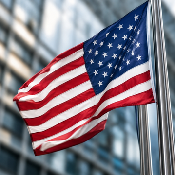An American flag waves against a backdrop of a modern glass office building, symbolizing the U.S. regulatory authority referenced in the post about Tether's USDT facing potential delisting from U.S. exchanges by 2028 under the GENIUS Act.
