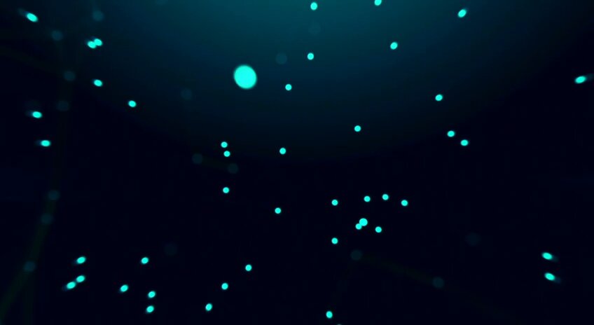 The image features a large screen with a dark blue background that appears to be filled with small dots of varying sizes scattered throughout. The dots are predominantly blue and white, creating an abstract pattern across the screen. The caption below the image reads "AI + zero-knowledge + private stablecoin rails is a pretty strong narrative." This suggests that the image might be related to cryptocurrency or blockchain technology in some way.