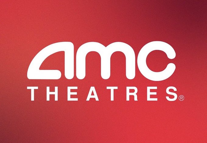 The image shows the white "AMC THEATRES" logo on a bright red background. It relates to the post's claim that AMC ($AMC), rather than Cinemark or Regal, is the largest movie theater company in the world.