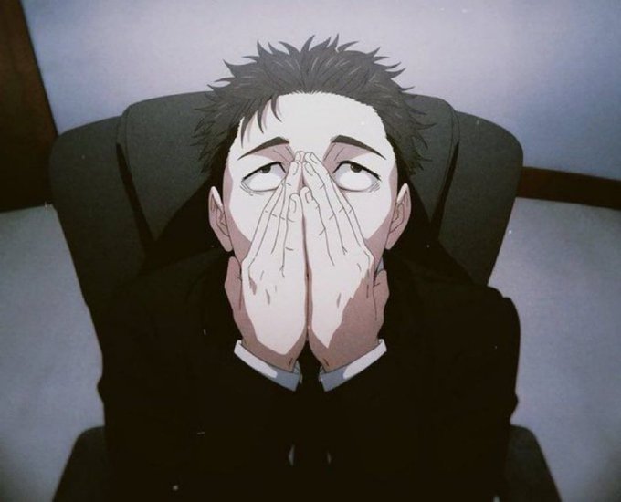 Anime-style illustration of a tired-looking young man with spiky hair covering his face with both hands, appearing exhausted while seated in a dark chair.