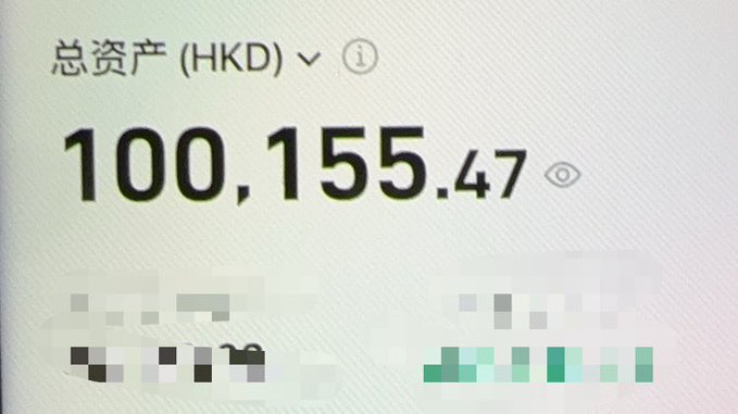 The image shows a screenshot of a computer screen displaying a message that reads "Thank you $dram $nok $hynix US stock and Hong Kong stock account has reached 100,000 HKD". The text appears to be in Chinese, indicating that the photo was taken in China or is related to a Chinese-speaking audience.

The image also contains two stock symbols: one for Hong Kong and another for the United States. This suggests that the post might be about investing in either of these markets.