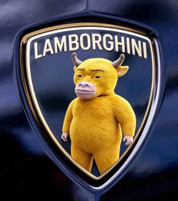 A humorous edited image of a yellow, furry bull-like character with horns standing inside a gold and black Lamborghini shield logo.