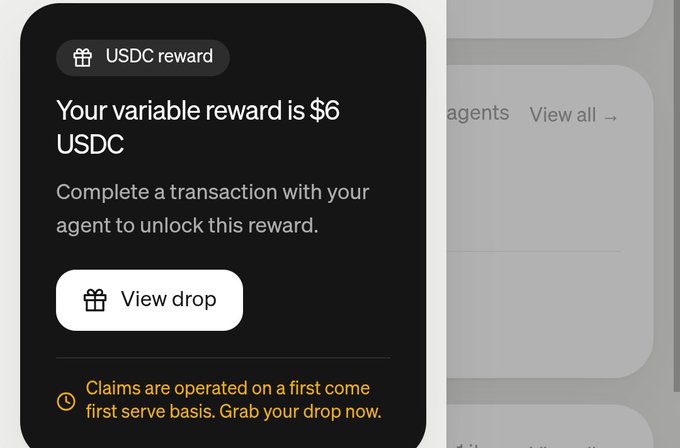 A digital interface notification shows 'USDC reward: Your variable reward is $6 USDC', prompting the user to 'View drop' to complete a transaction.