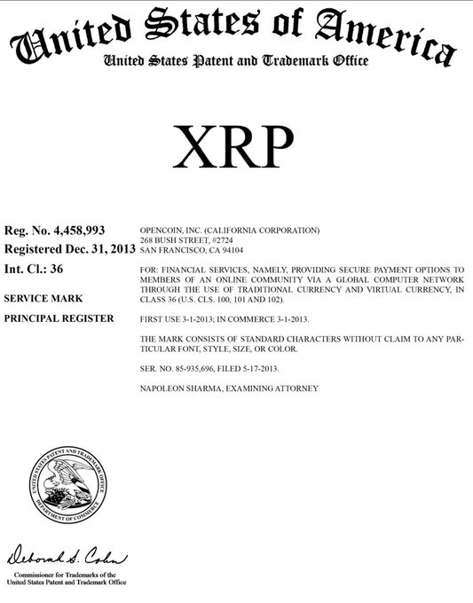An official USPTO trademark registration certificate for 'XRP' registered to OpenCoin, Inc. in San Francisco, CA, registered Dec. 31, 2013, for financial services including virtual currency.