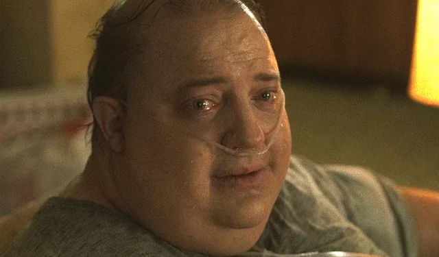 The image shows a man with a large nose, wearing glasses, sitting down and looking off into the distance. The scene appears to be set indoors, possibly in someone's living room or bedroom. There are no texts or other objects present in the image that directly relate to the caption provided.