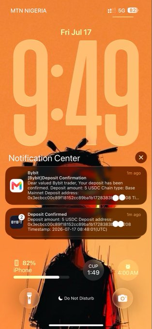 iPhone lock screen displaying time 9:49 on Fri Jul 17, with notification center showing two Bybit deposit confirmations for 5 USDC on the Base Mainnet.