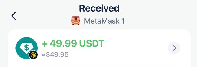 A MetaMask wallet screenshot showing a received transaction of "+ 49.99 USDT" (≈ $49.95) labeled "MetaMask 1," which the poster shared as proof of their first small crypto earnings in July thanks to Audiera_web3 and myfanforce.