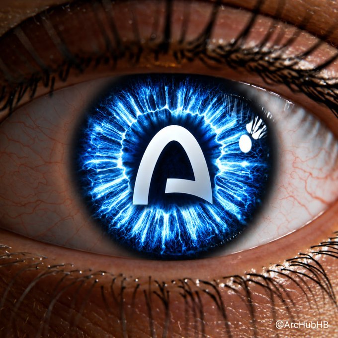 A close-up of a human eye with a glowing blue iris featuring a white "A" symbol in the center, watermarked "@ArcHubHB".