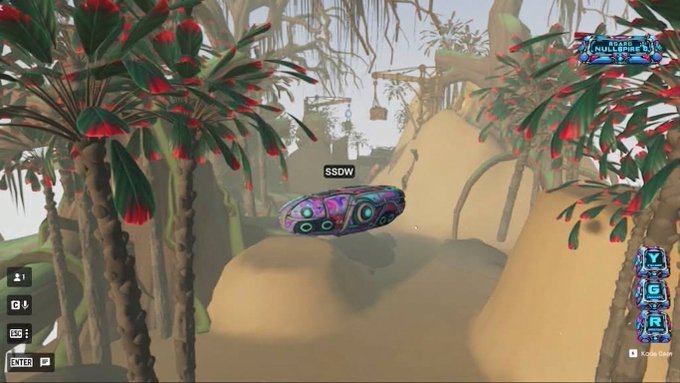 A video game screenshot showing a colorful patterned vehicle labeled 'SSDW' hovering in a jungle environment with red flowers and game UI elements visible.