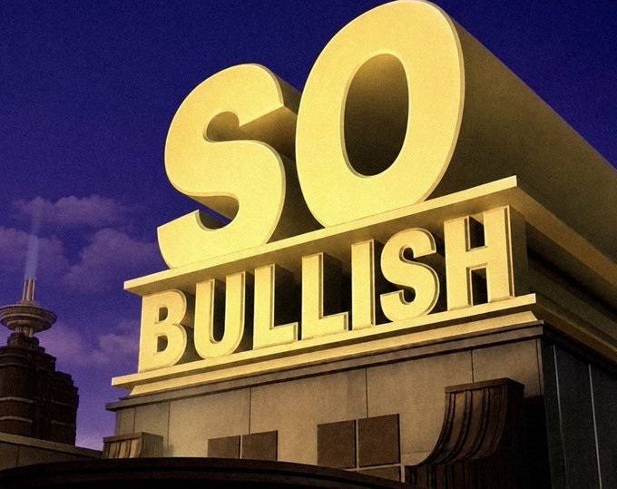 A large golden building displays the text "SO BULLISH" in massive block letters against a purple sky, with a tower visible in the background.