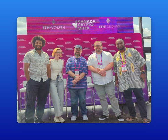 Five people pose together at a 'Canada Crypto Week' and 'ETHWomen' event, standing in front of a pink backdrop with sponsor logos.