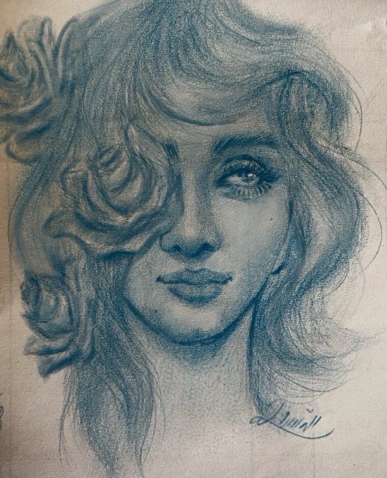 The image features a sketch of a woman's face with long hair, wearing a flowery headband. The drawing has a blue color scheme that gives it an artistic touch. The artist who created this piece of art is named Lucien Wall. The image also includes text that reads "Good Morning It's Tezos Tuesday!! ghooo 1/1 objkt.com/tokens/KT1VHox". This suggests the post might be related to a specific event or theme, such as a social media account dedicated to art or a personal project by Lucien Wall.