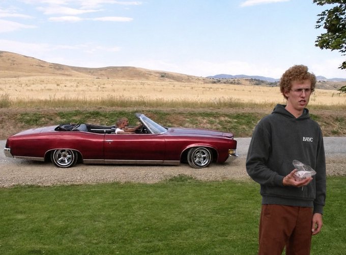A young man wearing a hoodie with "DAYC" text stands proudly in front of a maroon classic convertible, likely celebrating his membership in a car club in a scenic countryside setting.