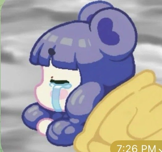 A cartoon-style sticker of a sad purple bear character with a tear running down its face, with a timestamp of '7:26 PM' in the corner.