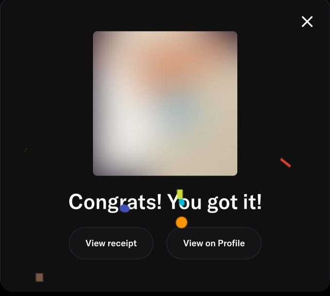 A digital pop-up screen on a black background displays a blurred square image and the white text 'Congrats! You got it!' above two buttons reading 'View receipt' and 'View on Profile'.