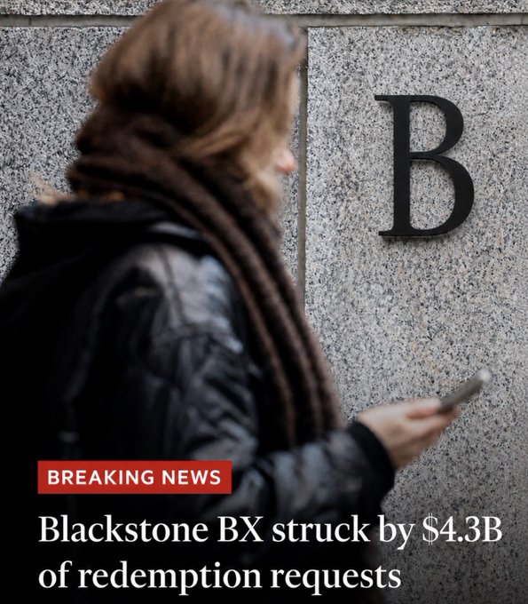 A blurred woman in a winter coat and scarf walks past a stone wall featuring a large "B" logo while looking at her phone. The image carries a "BREAKING NEWS" banner with the headline "Blackstone BX struck by $4.3B of redemption requests," visually setting the scene for the post's commentary about Michael Burry.