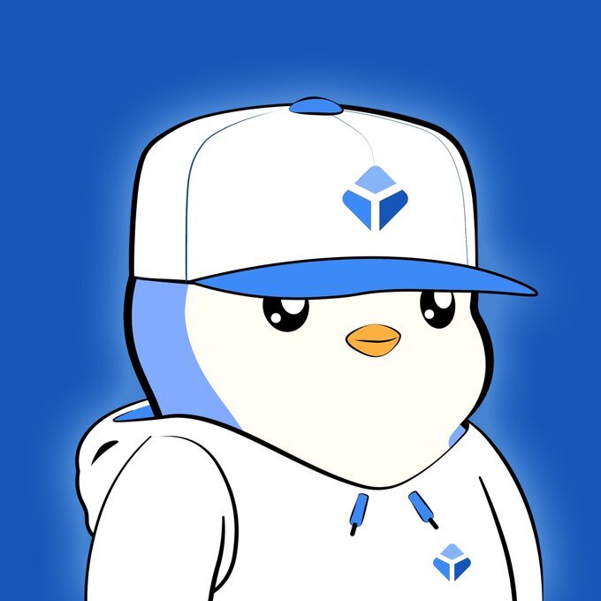 An illustrated cartoon penguin mascot wearing a white and blue cap and hoodie with a blue cube logo, set against a blue background.