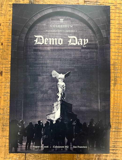 A poster for "COLOSSEUM ACCELERATOR - COHORT V Demo Day" featuring a black and white photograph of the Winged Victory of Samothrace statue with a crowd of people below, listing the event details as "August 26, 2026 | Colosseum HQ | San Francisco."