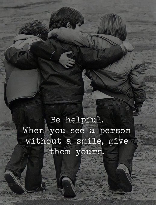 A black and white photo of three children with their arms around each other walking away, overlaid with the inspirational text: 'Be helpful. When you see a person without a smile, give them yours.'