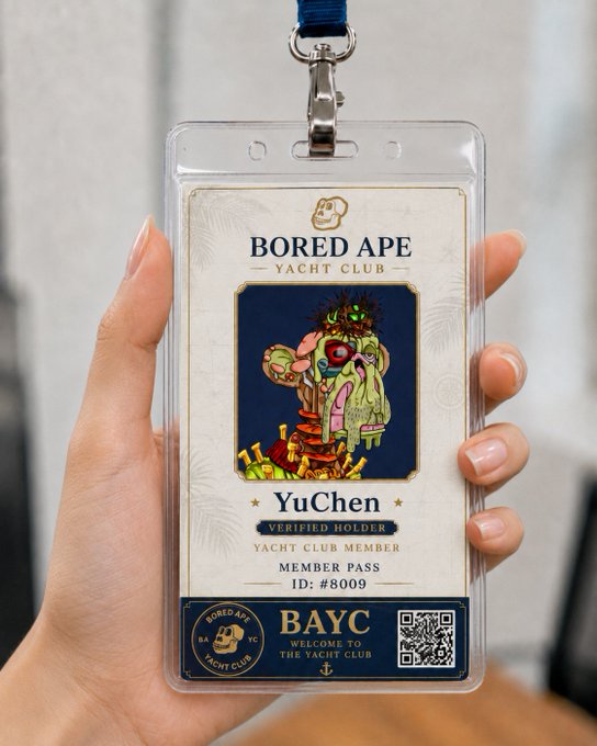 The image shows a hand holding up a small card or lanyard, which appears to be a lanyard with a picture of an animated character on it. The card has a name tag that reads "YUchen" and says "Certified Holders". There is also a QR code present in the image. The post seems to be related to BAYC, as indicated by the name tag and the presence of the QR code.