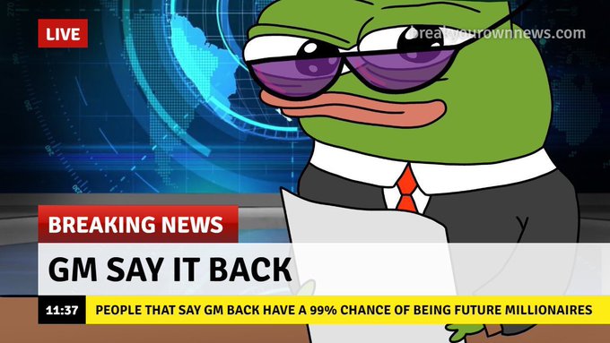 A meme-style news broadcast featuring a Pepe the Frog character in a suit and sunglasses, with 'LIVE' and 'realgownrownnews.com' watermarks. Text reads 'BREAKING NEWS: GM SAY IT BACK' and 'PEOPLE THAT SAY GM BACK HAVE A 99% CHANCE OF BEING FUTURE MILLIONAIRES' with a timestamp of 11:37.