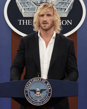 A blonde man in a black suit and white shirt stands at a podium bearing the seal of the Department of Defense, in front of a backdrop reading "THE PENTAGON," appearing to humorously pose as a government official delivering investment advice.