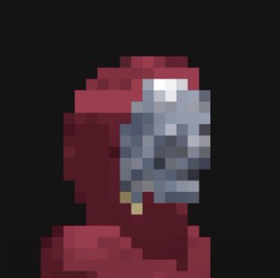 A pixelated, low-resolution image of a red figure with a gray skull-like face, appearing to be from a retro video game.