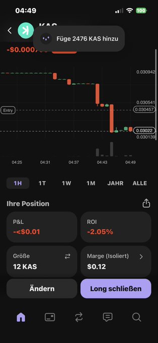 The image shows a phone screen displaying a stock trading app with its interface open, allowing users to view the latest stock price fluctuations. The app provides information about the market trend through graphs and charts that show the change in stock prices over time. There is a downward-sloping graph indicating a decline in the stock's value or a decrease in market sentiment related to the specific stocks being tracked. The stock symbol "KAS" appears multiple times, which might be relevant to the analysis of the chart data.