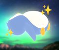 A small digital illustration shows a fluffy, blue and white cloud-like figure with arms and legs, set against a starry night sky with green auroras.