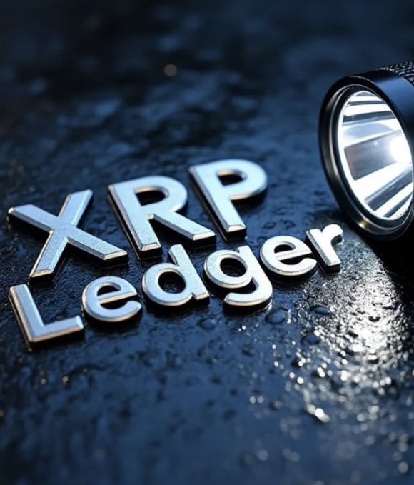 A stylized 3D rendering of the XRP Ledger logo in metallic silver lettering, set against a wet, dark textured surface with a flashlight beam illuminating the text from the upper right.