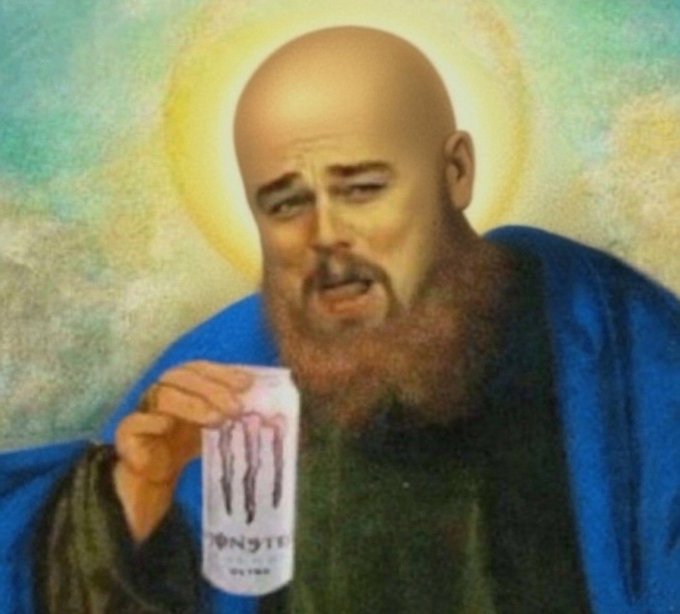A painted-style image of a bald, bearded saint figure with a halo, holding a Monster Energy drink, depicting a humorous 'Saint of Energy' meme.