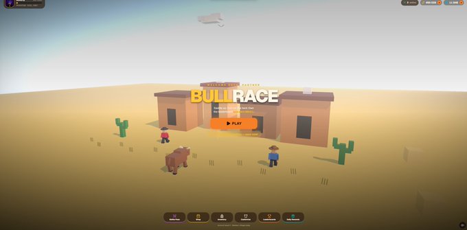 A screenshot of a 3D game titled 'BULL RACE' featuring a desert scene with cacti, a bull character, and avatars near a building with a 'PLAY' button.