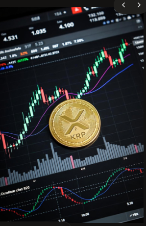 Close-up photo of a gold XRP (XRP/KRP) cryptocurrency coin resting on a screen displaying financial candlestick charts and market data including numbers like 4,531 and 1,035.