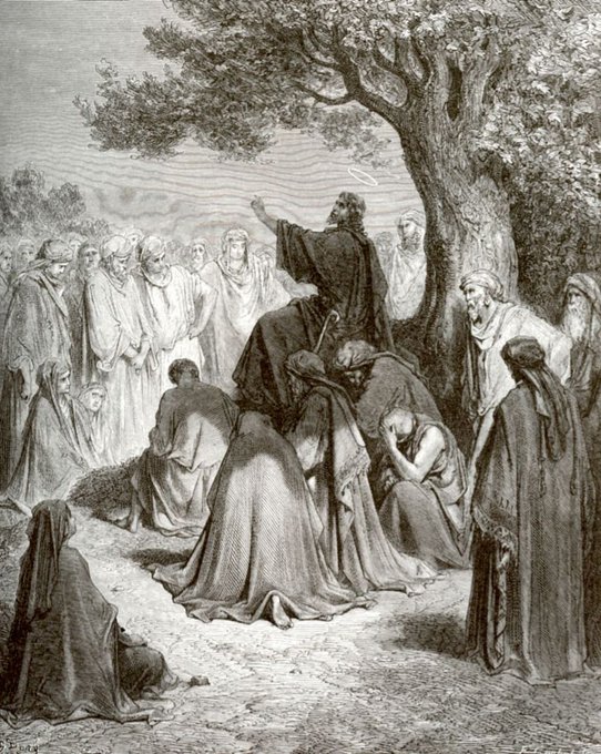 A black and white classical engraving depicting a bearded man gesturing toward the sky while addressing a crowd of robed figures gathered under a large tree.