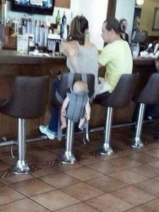 An optical illusion image shows bar stools at a counter that appear to feature small human-like figures integrated into their design.