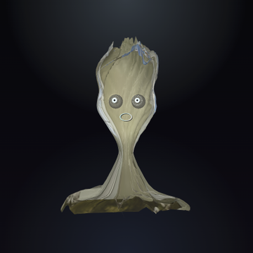A 3D-rendered, olive-green character with a tall, curved shape, large round eyes, and small blue figures on its head stands against a dark background.