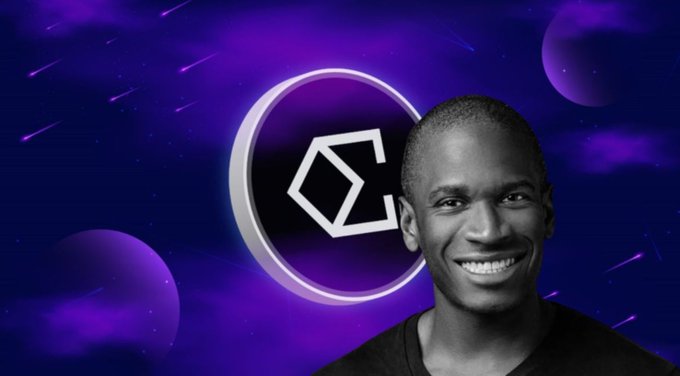 A black-and-white photo of a smiling man displayed against a purple cosmic background with the Polygon (MATIC) cryptocurrency logo, possibly indicating an endorsement or association.