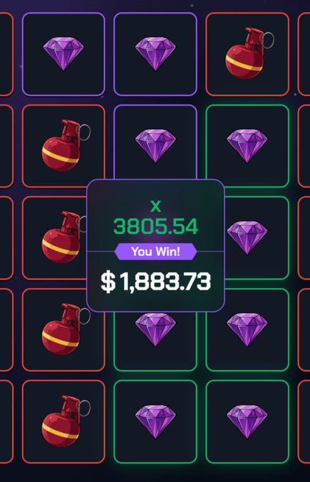 A screenshot of a slot machine game showing a winning payout of $1,883.73 from the Ethos (E) token, with a multiplier of 3805.54 displayed alongside bomb and diamond symbols on the reels.