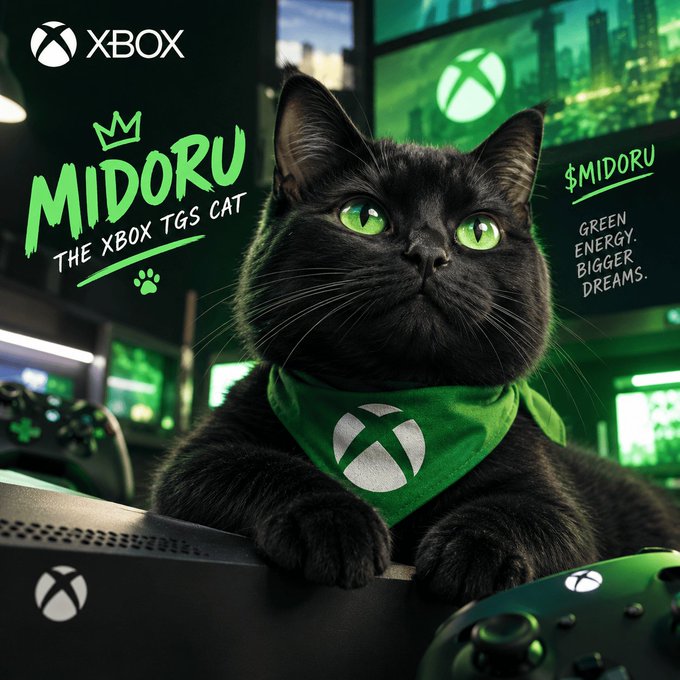 A black cat named 'MIDORU' with glowing green eyes wears a green Xbox-themed bandana, sitting in front of Xbox consoles. Text reads 'MIDORU THE XBOX TGS CAT' and '$MIDORU GREEN ENERGY. BIGGER DREAMS.' with the Xbox logo prominently displayed.