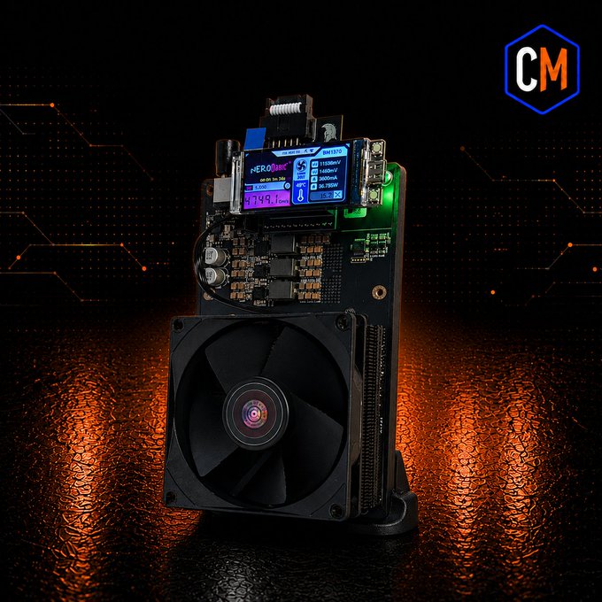 An electronic testing device branded "CM" with a digital display showing power readings, mounted above a large black PC cooling fan against a dramatic orange-lit background.