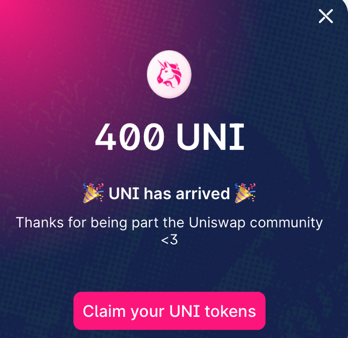 A Uniswap airdrop notification celebrating the receipt of 400 UNI tokens, with a "Claim your UNI tokens" button, illustrating how early users who simply made a swap order received free tokens that later became worth a fortune at Uniswap's 2021 peak.