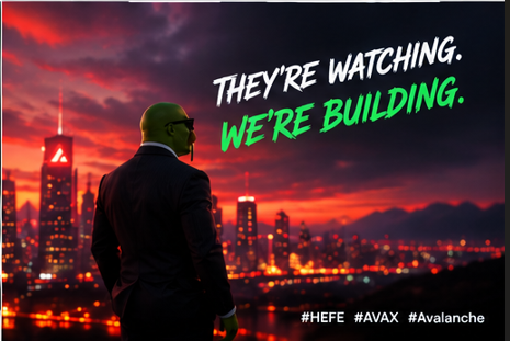 A promotional graphic featuring a man in a suit looking at a city skyline at sunset, with text reading 'THEY'RE WATCHING. WE'RE BUILDING.' and hashtags '#HEFE #AVAX #Avalanche'.