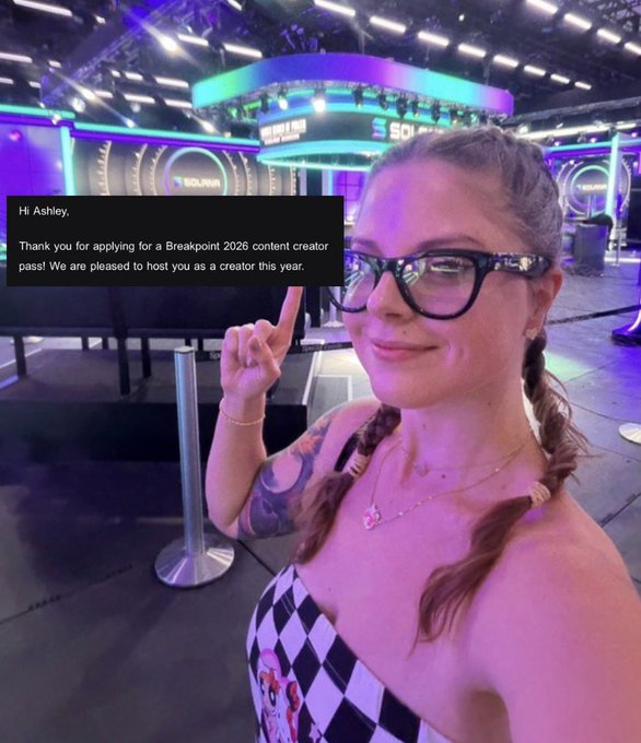 A selfie of a woman with glasses and braided hair at an event, with an overlay message reading: 'Hi Ashley, Thank you for applying for a Breakpoint 2026 content creator pass! We are pleased to host you as a creator this year.'