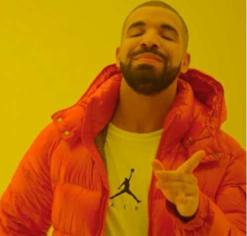 A man with a beard, wearing a bright red puffer jacket over a white 'AIR' Jordan shirt, smiles with closed eyes and points his finger against a solid yellow background.