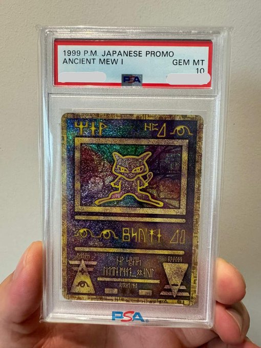 In the image, there is an electronic device, possibly a gaming system or an accessory, being held by someone against the backdrop of a white wall. The object appears to be part of a collection or assortment and could potentially be related to video games. There is text in the image that reads "Selling my $BTC OTC and asked buyer a proof of funds." This may indicate that the person holding the device is selling it, possibly on an online marketplace like eBay.